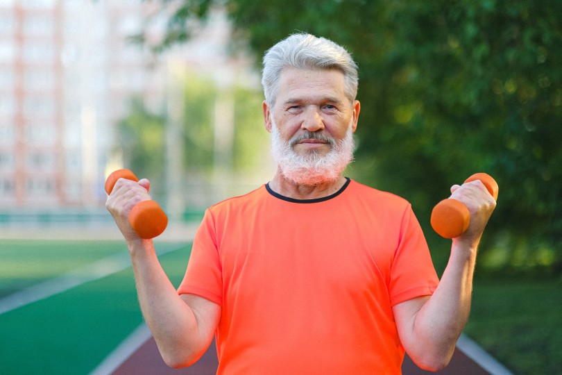 Man holding weights Man holding weights