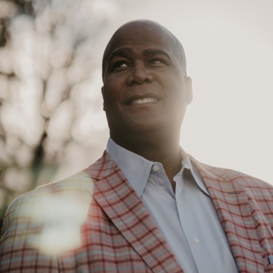 Man in red plaid suit